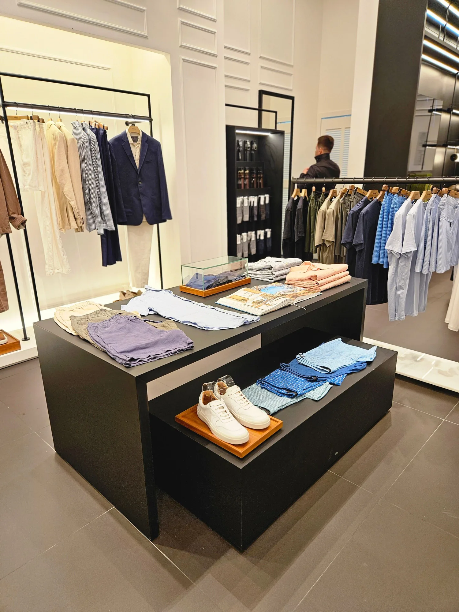 Contemporary premium fashion retail interior.